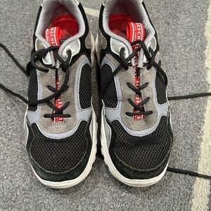 Skechers woman’s Black and Grey Athletic Shoes